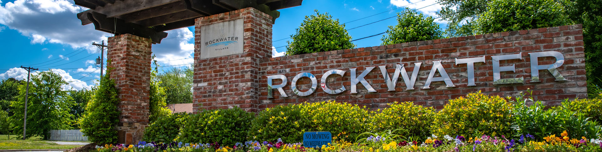 rockwater village entrance sign